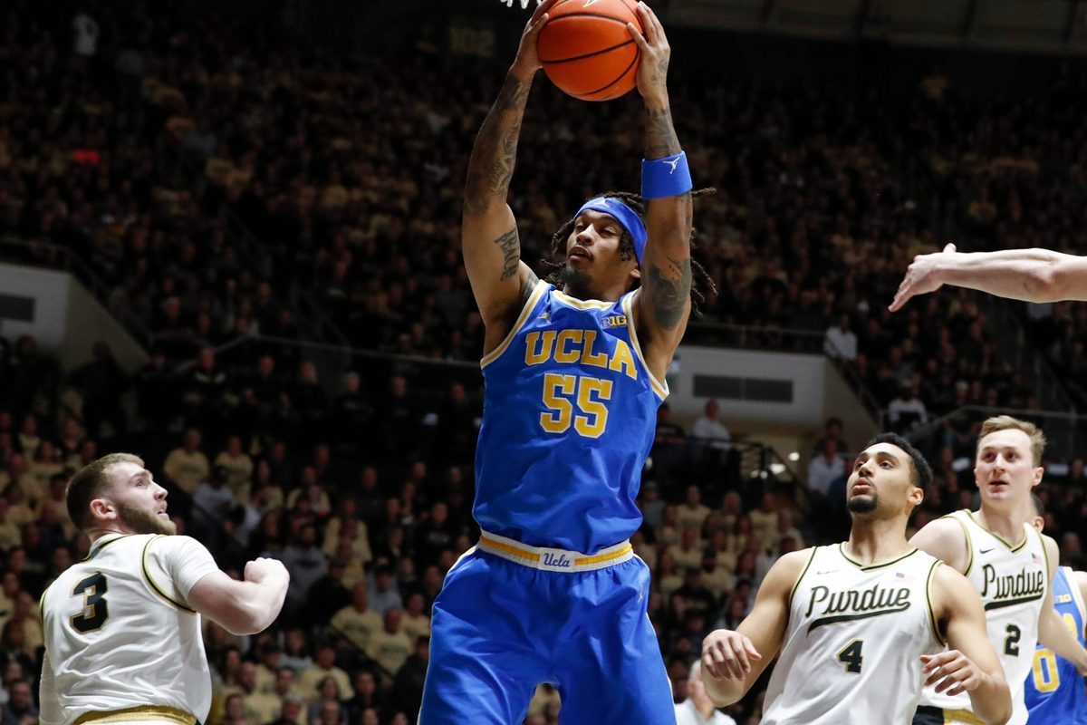 UCLA Bruins guard Skyy Clark (55) grabs a rebound Friday, Feb. 28, 2025, during the NCAA men’s basketball game against the Purdue Boilermakers at Mackey Arena in West Lafayette, Ind.