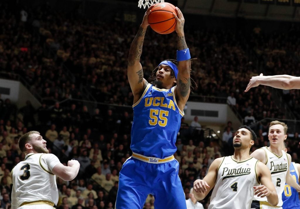 UCLA Bruins guard Skyy Clark (55) grabs a rebound Friday, Feb. 28, 2025, during the NCAA men’s basketball game against the Purdue Boilermakers at Mackey Arena in West Lafayette, Ind.
