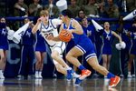 Mar 4, 2025; Colorado Springs, Colorado, USA; Boise State Broncos guard Julian Bowie (0) controls the ball as Air Force Falcons guard Sam Duskin (23) guards in the second half at Clune Arena. Mandatory Credit: Isaiah J. Downing-Imagn Images