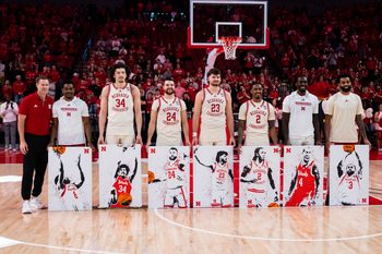 Mar 9, 2025; Lincoln, Nebraska, USA; Nebraska Cornhuskers head coach Fred Hoiberg, guard Jeffrey Grace III (8), center Braxton Meah (34), guard Rollie Worster (24), forward Andrew Morgan (23), guard Ahron Ulis (2), forward Juwan Gary (4) and guard Brice Williams (3) pose during the Senior Day ceremony before the game against the Iowa Hawkeyes at Pinnacle Bank Arena. Mandatory Credit: Dylan Widger-Imagn Images