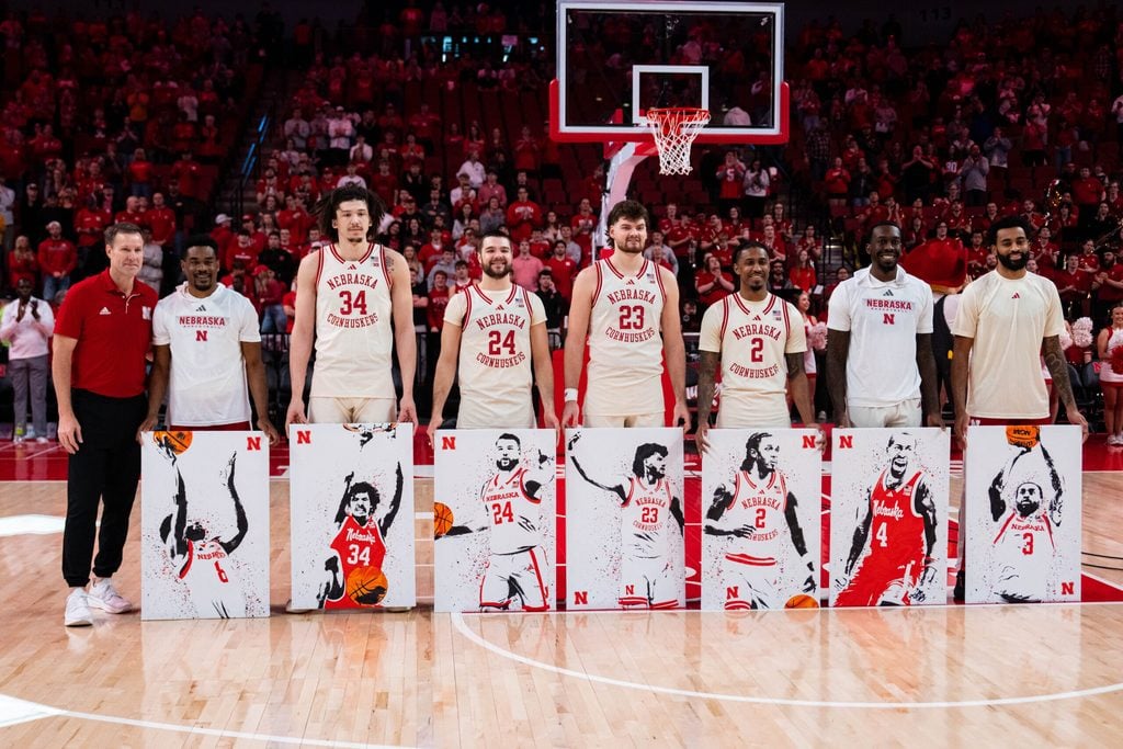 Mar 9, 2025; Lincoln, Nebraska, USA; Nebraska Cornhuskers head coach Fred Hoiberg, guard Jeffrey Grace III (8), center Braxton Meah (34), guard Rollie Worster (24), forward Andrew Morgan (23), guard Ahron Ulis (2), forward Juwan Gary (4) and guard Brice Williams (3) pose during the Senior Day ceremony before the game against the Iowa Hawkeyes at Pinnacle Bank Arena. Mandatory Credit: Dylan Widger-Imagn Images