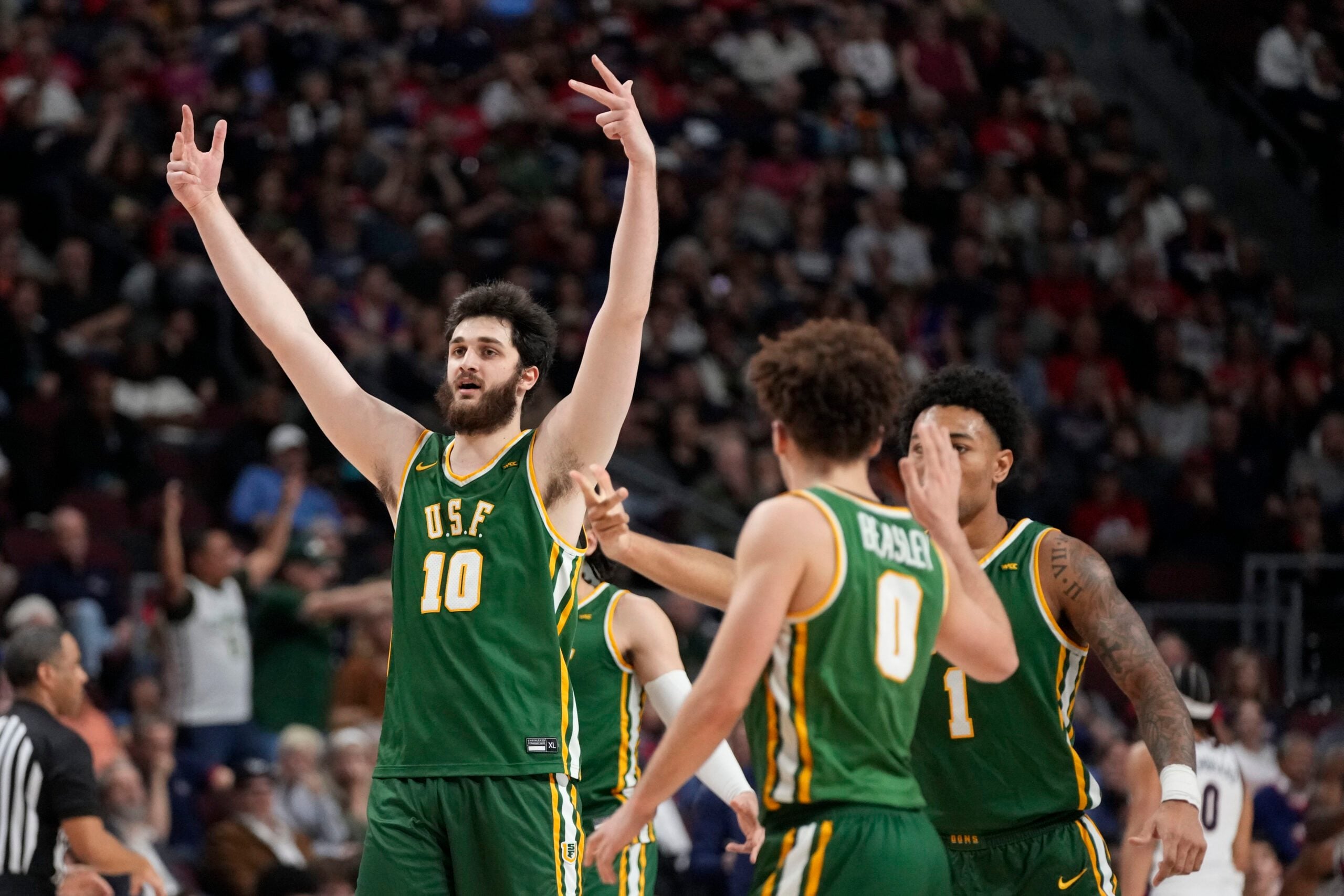 March 10, 2025; Las Vegas, NV, USA; San Francisco Dons center Saba Gigiberia (10) celebrates against the Gonzaga Bulldogs during the first half in the semifinal of the West Coast Conference tournament at Orleans Arena. Mandatory Credit: Kyle Terada-Imagn Images