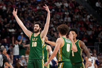 March 10, 2025; Las Vegas, NV, USA; San Francisco Dons center Saba Gigiberia (10) celebrates against the Gonzaga Bulldogs during the first half in the semifinal of the West Coast Conference tournament at Orleans Arena. Mandatory Credit: Kyle Terada-Imagn Images