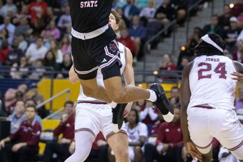 Dyondre Dominguez (45) takes it to the hoop during the Sun Belt Conference men's basketball championship game between Troy and Arkansas State at the Bay Center in Pensacola on Monday, March 10, 2025.