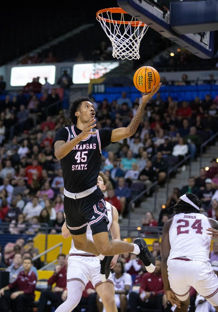 Dyondre Dominguez (45) takes it to the hoop during the Sun Belt Conference men's basketball championship game between Troy and Arkansas State at the Bay Center in Pensacola on Monday, March 10, 2025.