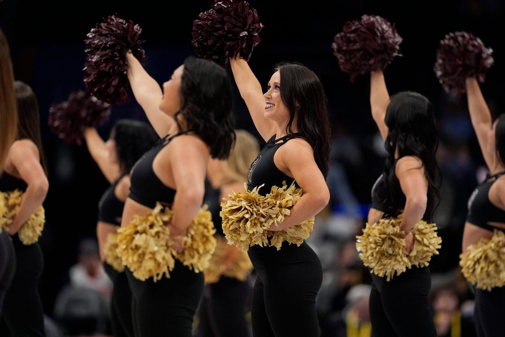 Mar 11, 2025; Charlotte, NC, USA; Florida State Seminoles cheerleaders perform during the first half against the Syracuse Orange at Spectrum Center. Mandatory Credit: Jim Dedmon-Imagn Images