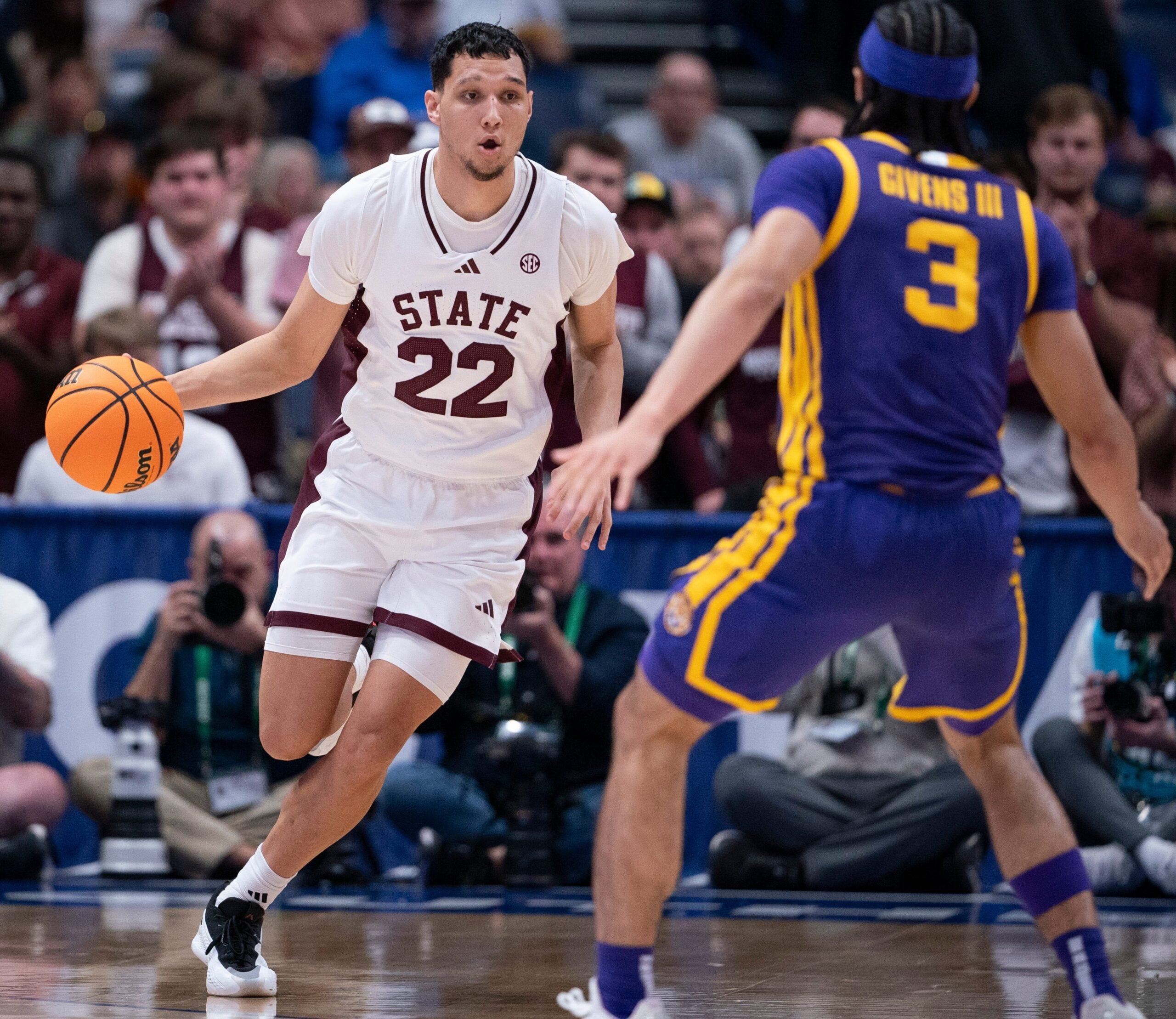 Mississippi State Bulldogs forward RJ Melendez (22) brings the ball up court against LSU Tigers guard Curtis Givens III (3) during their first round game of the SEC Men's Basketball Tournament at Bridgestone Arena in Nashville, Tenn., Wednesday, March 12, 2025.