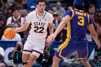 Mississippi State Bulldogs forward RJ Melendez (22) brings the ball up court against LSU Tigers guard Curtis Givens III (3) during their first round game of the SEC Men's Basketball Tournament at Bridgestone Arena in Nashville, Tenn., Wednesday, March 12, 2025.