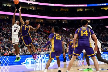 Mississippi State guard Dellquan Warren (6) shoots again LSU guard Jordan Sears (1) during a NCAA college basketball first round game at the men’s Southeastern Conference Tournament Wednesday, March 12, 2025, in Nashville, Tenn.