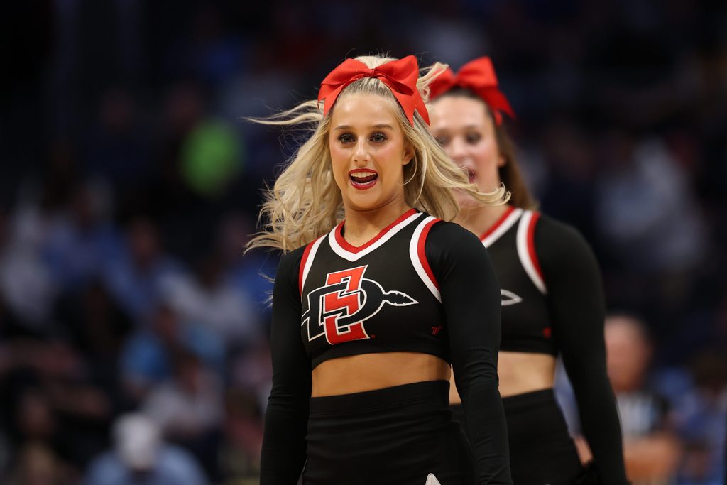 Mar 18, 2025; Dayton, OH, USA; San Diego State Aztecs cheerleaders perform in the first half against the North Carolina Tar Heels at UD Arena. Mandatory Credit: Rick Osentoski-Imagn Images