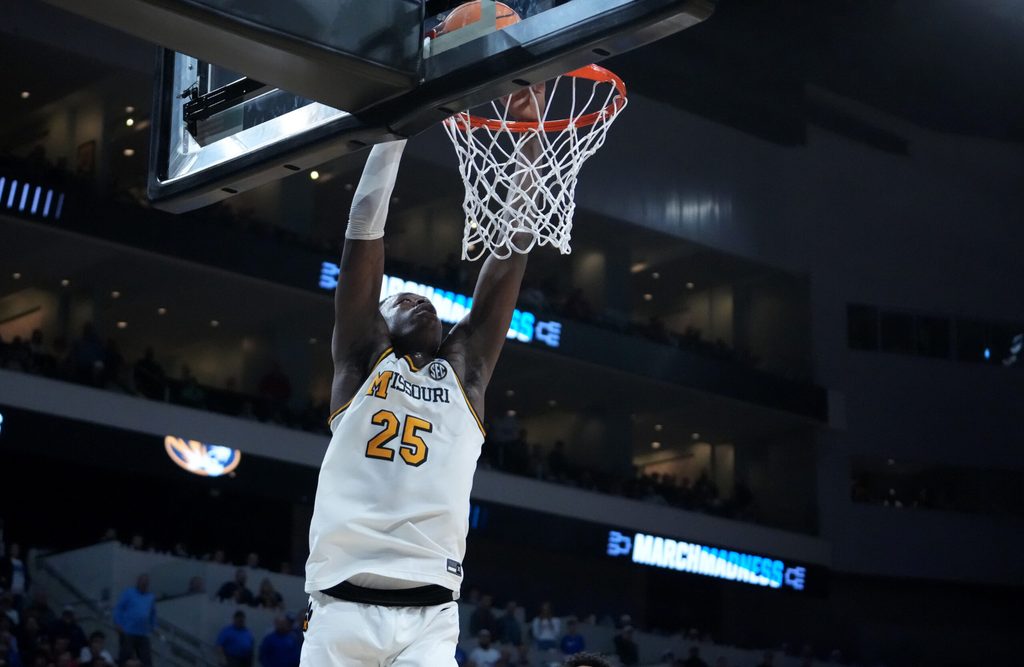 Mar 20, 2025; Wichita, KS, USA; Missouri Tigers guard Mark Mitchell (25) dunks in the second half of a first round men’s NCAA Tournament game Drake Bulldogs at Intrust Bank Arena. Mandatory Credit: Kirby Lee-Imagn Images