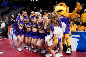 Mar 21, 2025; Columbia, South Carolina, USA; Tennessee Tech Golden Eagles cheerleaders and mascot during the first half  against the South Carolina Gamecocks at Colonial Life Arena. Mandatory Credit: Jim Dedmon-Imagn Images