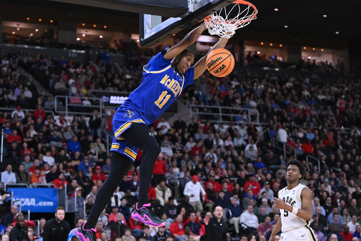 Mar 22, 2025; Providence, RI, USA; McNeese State Cowboys guard Quadir Copeland (11) dunks during the second half of a second round men’s NCAA Tournament game against the Purdue Boilermakers at Amica Mutual Pavilion. Mandatory Credit: Brian Fluharty-Imagn Images