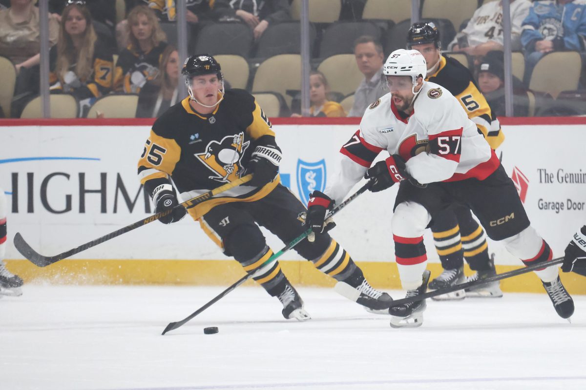 Mar 30, 2025; Pittsburgh, Pennsylvania, USA; Ottawa Senators left wing David Perron (57) moves the puck against Pittsburgh Penguins center Noel Acciari (55) during the first period at PPG Paints Arena. Mandatory Credit: Charles LeClaire-Imagn Images