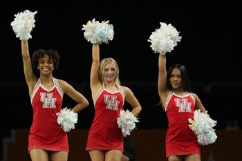 Apr 4, 2025; San Antonio, TX, USA; The Houston Cougars cheerleaders perform during a practice session for the Final Four of the 2025 NCAA tournament at Alamodome. Mandatory Credit: Bob Donnan-Imagn Images