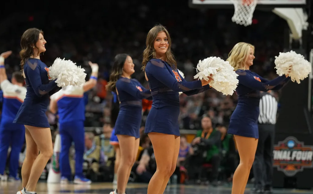 Apr 5, 2025; San Antonio, TX, USA; Auburn Tigers cheerleaders perform against the Florida Gators in the semifinals of the men's Final Four of the 2025 NCAA Tournament at the Alamodome. Mandatory Credit: Robert Deutsch-Imagn Images