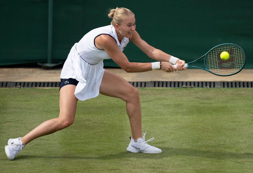 Jul 1, 2025; Wimbledon, UNITED KINGDOM; Polina Kudermetova returns a shot during her match against Iga Swiatek of Poland on day two at the All England Lawn Tennis and Croquet Club. Mandatory Credit: Susan Mullane-Imagn Images