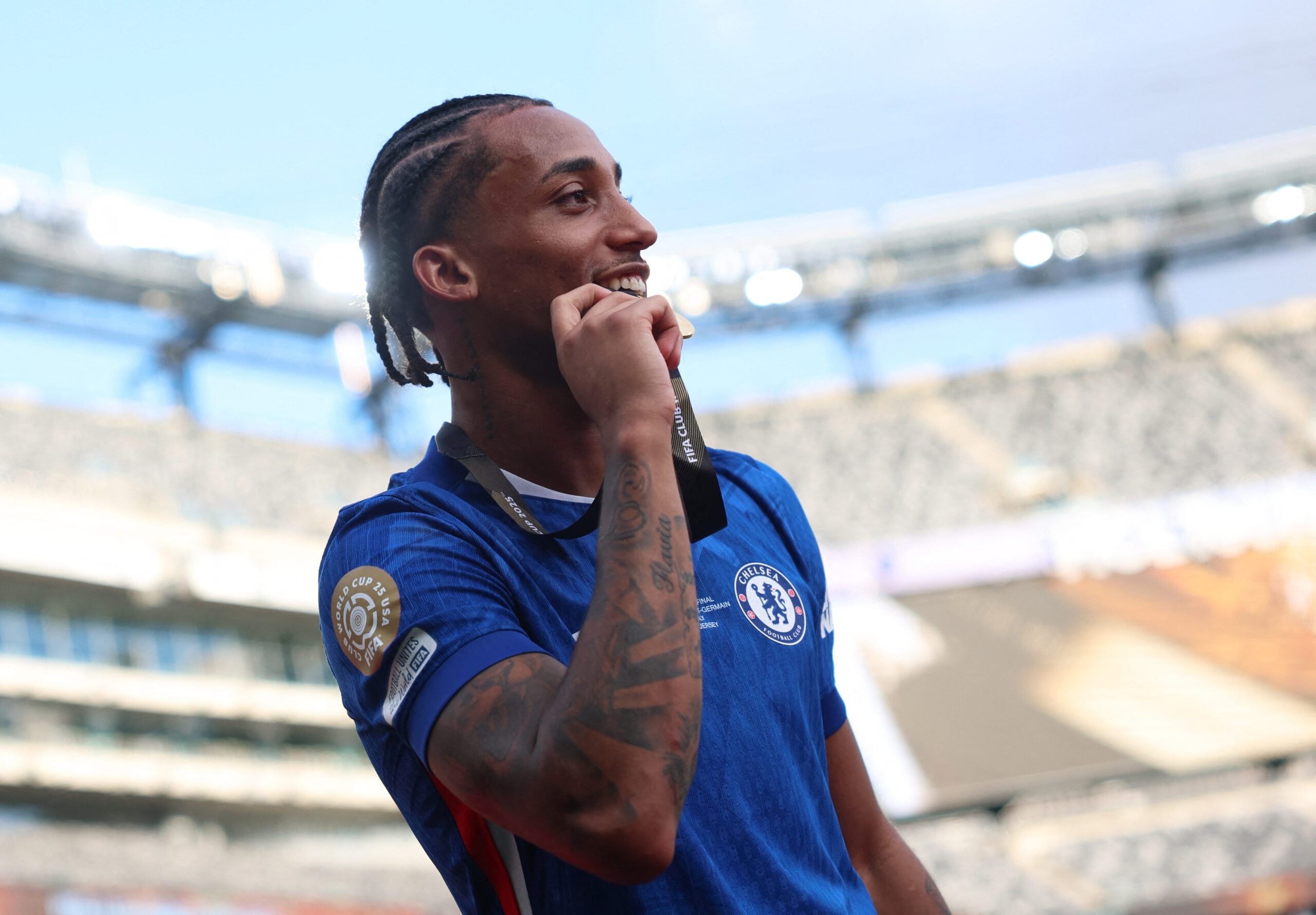 [Subscription Customers Only] Jul 13, 2025; East Rutherford, New Jersey, USA; Chelsea FC forward Joao Pedro (20) celebrates with his medal after winning the final of the 2025 FIFA Club World Cup at MetLife Stadium. Mandatory Credit: Hannah Mckay-Reuters via Imagn Images