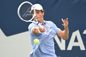 Jul 26, 2025; Toronto, ON, Canada;  Alexander Blockx (BEL) plays a shot against Duje Ajdukovic (CRO) during qualifying play at Sobeys Stadium. Mandatory Credit: Dan Hamilton-Imagn Images