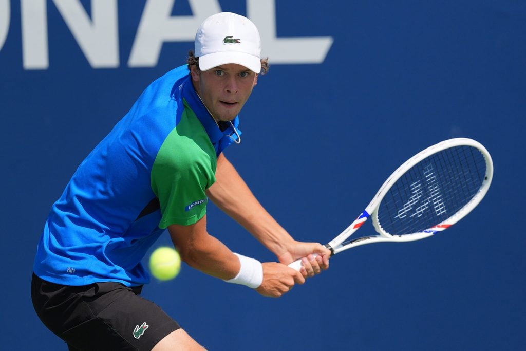 Jul 27, 2025; Toronto, ON, Canada; Alexander Blockx (BEL) tracks a ball hit by Duje Ajdukovic (not pictured) in qualifying play at Sobeys Stadium. Mandatory Credit: John E. Sokolowski-Imagn Images