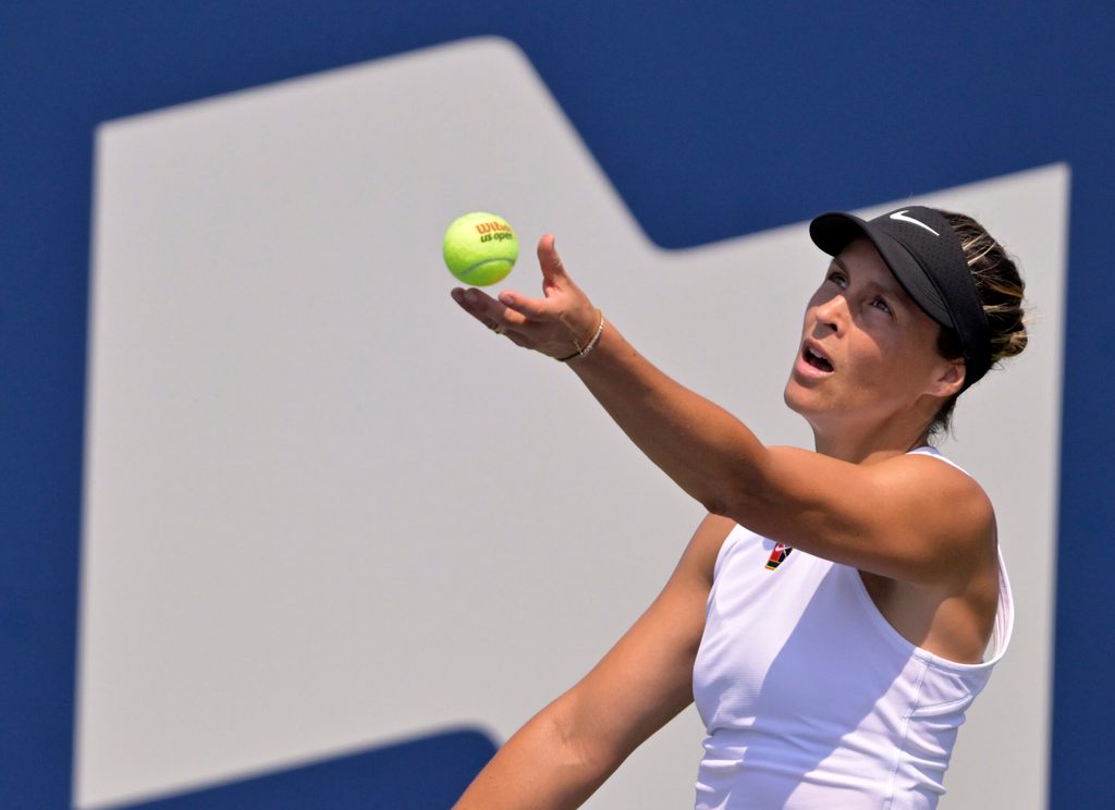 Jul 28, 2025; Montreal, QC, Canada; Tatjana Maria (GER) serves against Laura Siegemund (GER) in first round play at IGA Stadium. Mandatory Credit: Eric Bolte-Imagn Images