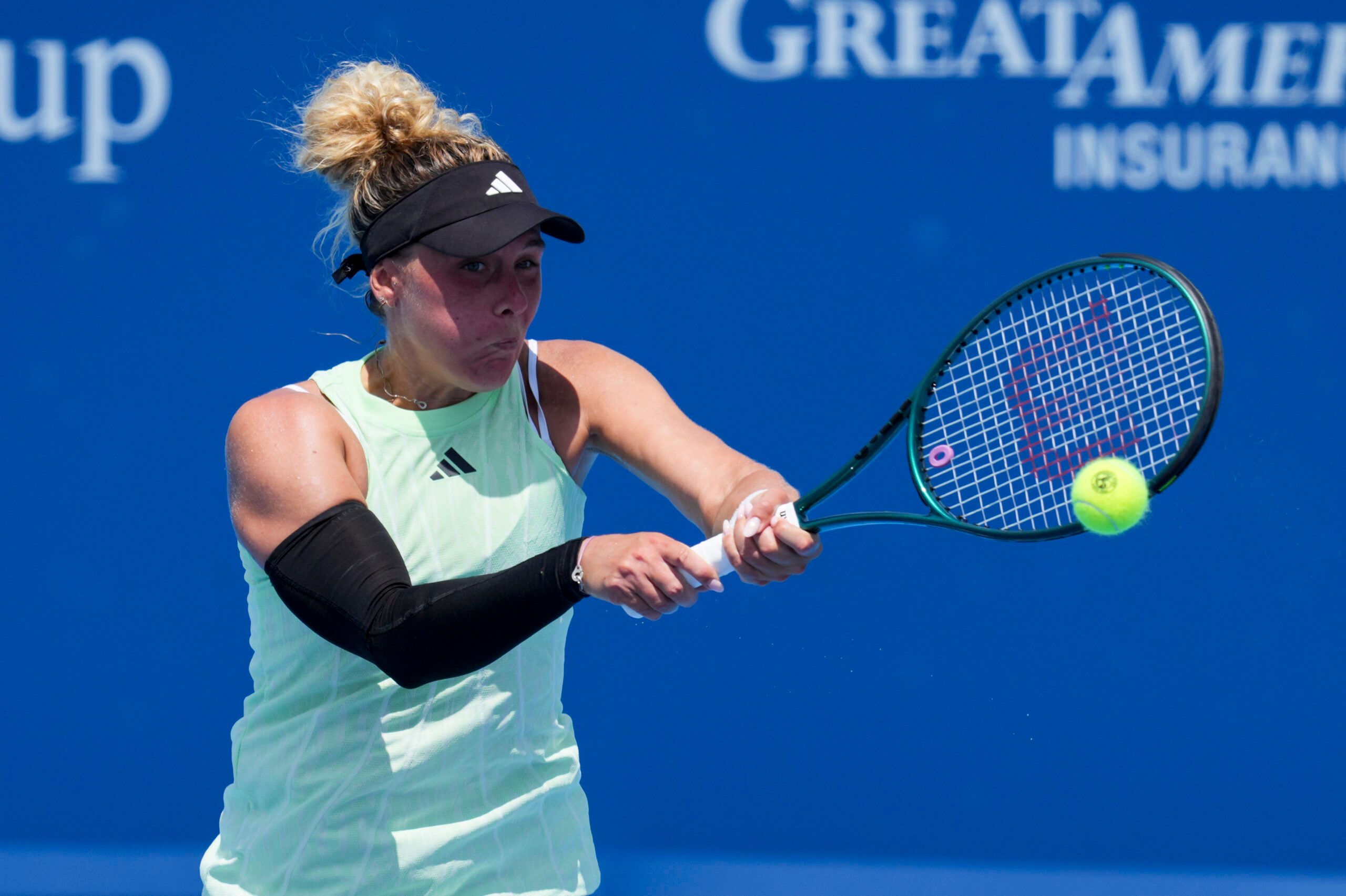 Aug 6, 2025; Cincinnati, OH, USA; Leolia Jeanjean (FRA) returns a shot against Carol Zhao (CAN) during the Cincinnati Open at the Lindner Family Tennis Center. Mandatory Credit: Aaron Doster-Imagn Images
