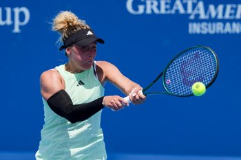 Aug 6, 2025; Cincinnati, OH, USA; Leolia Jeanjean (FRA) returns a shot against Carol Zhao (CAN) during the Cincinnati Open at the Lindner Family Tennis Center. Mandatory Credit: Aaron Doster-Imagn Images