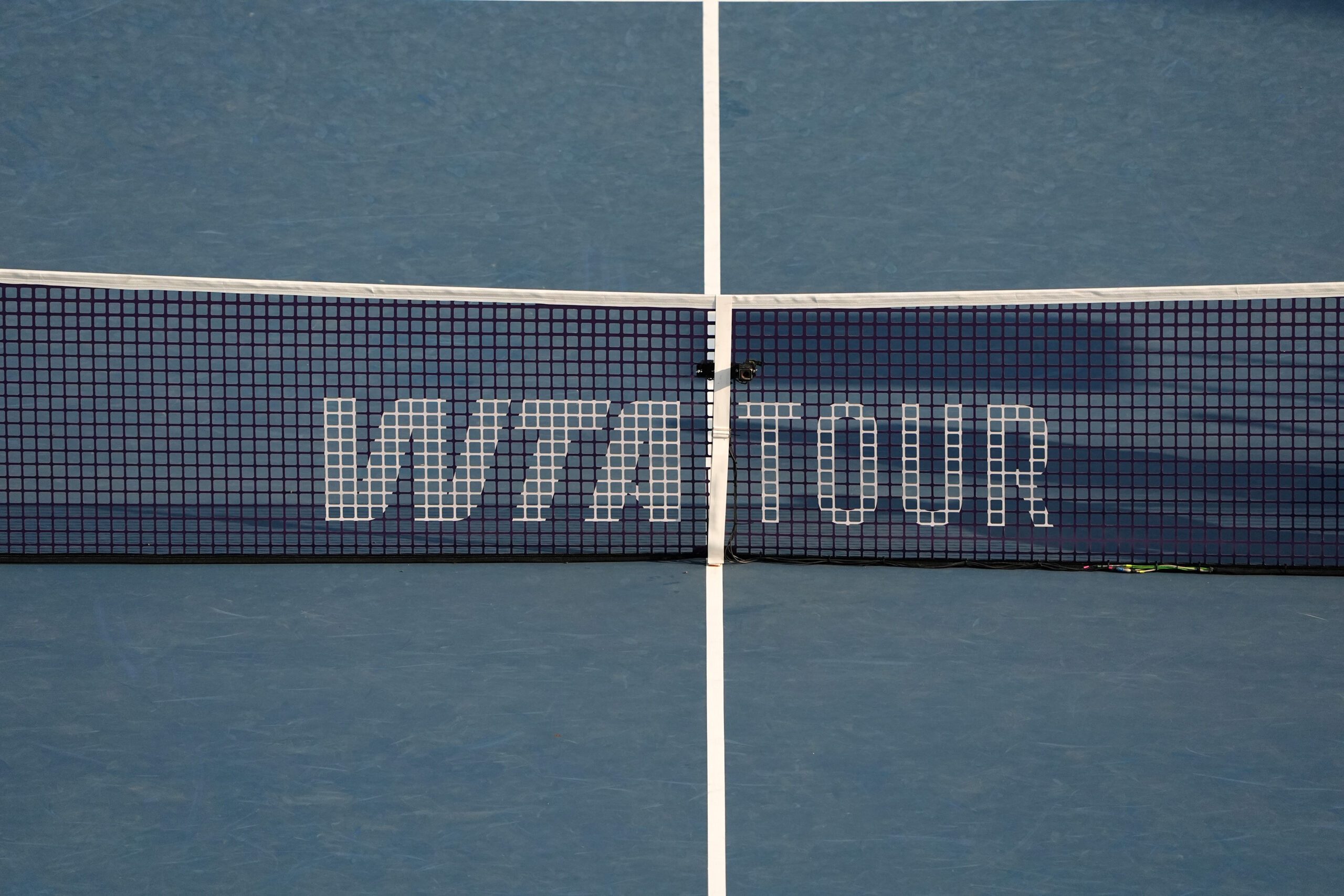 Aug 6, 2025; Montreal, QC, Canada;Tennis net with WTA tour logo during the Victoria Mboko (CAN) and Elena Rybakina (KAZ) match in semifinal play at IGA Stadium. Mandatory Credit: Eric Bolte-Imagn Images