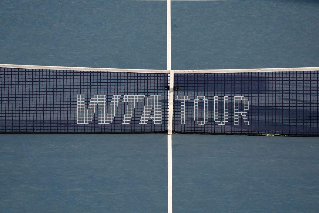 Aug 6, 2025; Montreal, QC, Canada;Tennis net with WTA tour logo during the Victoria Mboko (CAN) and Elena Rybakina (KAZ) match in semifinal play at IGA Stadium. Mandatory Credit: Eric Bolte-Imagn Images