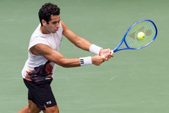 Sep 1, 2025; Flushing, NY, USA; Jaume Munar of Spain in action against Lorenzo Musetti of Italy in the fourth round of the men’s singles at the US Open at Louis Armstrong Stadium in Billie Jean King National Tennis Center. Mandatory Credit: Mike Frey-Imagn Images