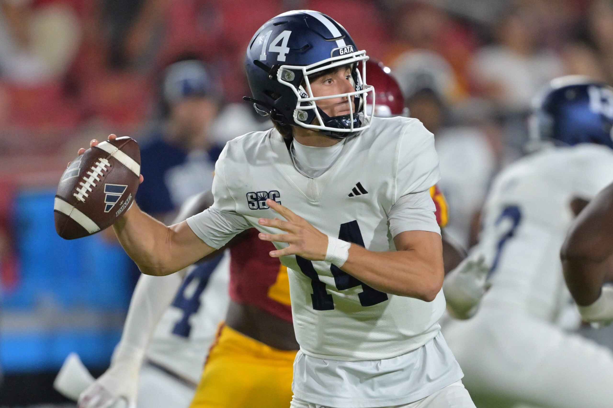 Sep 6, 2025; Los Angeles, California, USA; Georgia Southern Eagles quarterback Turner Helton (14) sets to pass in the second half against the USC Trojans at the Los Angeles Memorial Coliseum. Mandatory Credit: Jayne Kamin-Oncea-Imagn Images