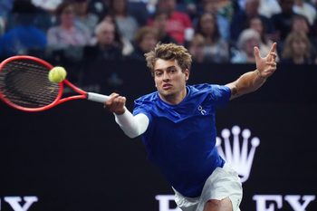 Sep 19, 2025; San Francisco, CA, USA; Team Europe player Flavio Cobolli hits a forehand against Team World player Joao Fonseca during match three of the Laver Cup at Chase Center. Mandatory Credit: David Gonzales-Imagn Images
