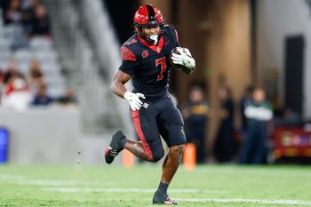 Oct 3, 2025; San Diego, California, USA; San Diego State Aztecs running back Lucky Sutton (7) runs the ball during the second half against the Colorado State Rams at Snapdragon Stadium. Mandatory Credit: David Frerker-Imagn Images