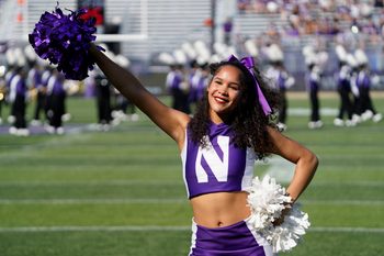 Oct 4, 2025; Evanston, Illinois, USA; Northwestern Wildcats cheerleaders before a game against the ULM Warhawks at Northwestern Medicine Field at Martin Stadium. Mandatory Credit: David Banks-Imagn Images