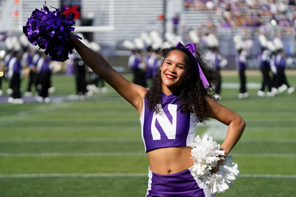 Oct 4, 2025; Evanston, Illinois, USA; Northwestern Wildcats cheerleaders before a game against the ULM Warhawks at Northwestern Medicine Field at Martin Stadium. Mandatory Credit: David Banks-Imagn Images