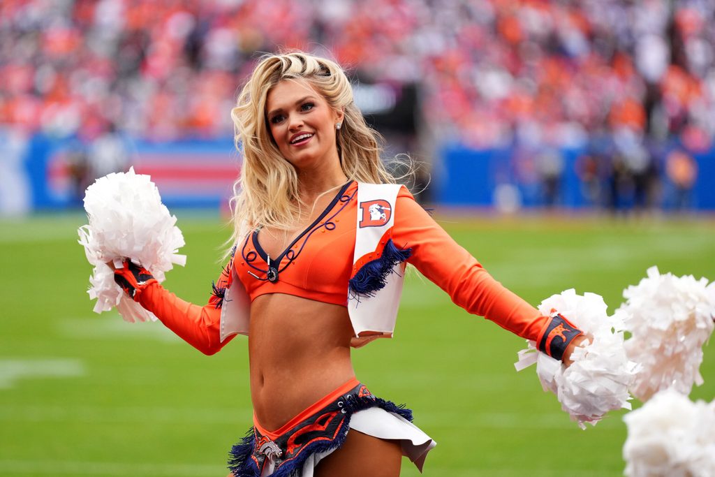 Oct 26, 2025; Denver, Colorado, USA; Denver Broncos cheerleaders perform against the Dallas Cowboys in the first half at Empower Field at Mile High. Mandatory Credit: Ron Chenoy-Imagn Images
