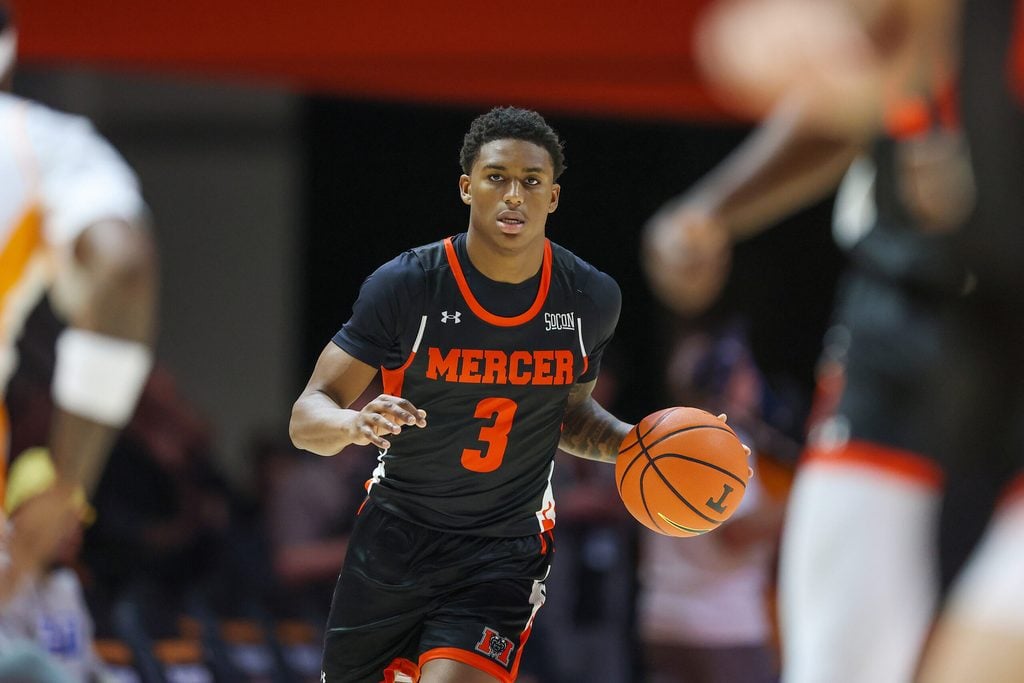 Nov 3, 2025; Knoxville, Tennessee, USA; Mercer Bears guard Quinton Perkins II (3) brings the ball up court against the Tennessee Volunteers during the second half at Thompson-Boling Arena at Food City Center. Mandatory Credit: Randy Sartin-Imagn Images