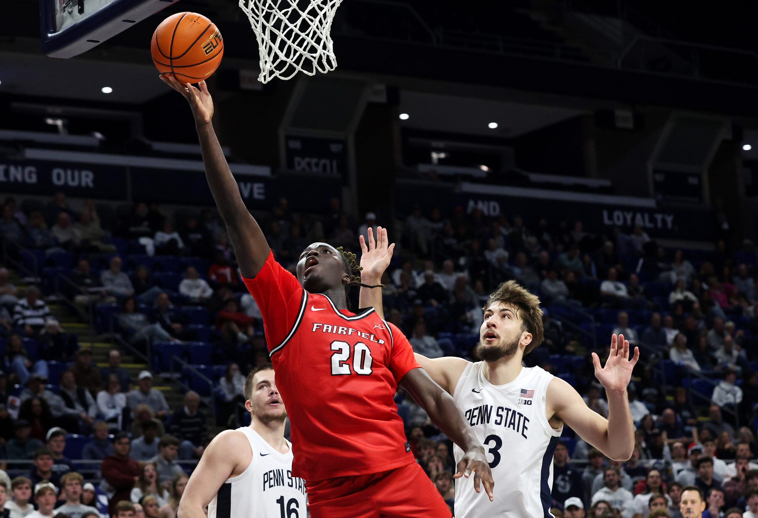 Nov 3, 2025; University Park, Pennsylvania, USA; Fairfield Stags forward Brandon Benjamin (20) drives the ball to the basket during the second half against the Penn State Nittany Lions at Bryce Jordan Center. Mandatory Credit: Matthew O'Haren-Imagn Images