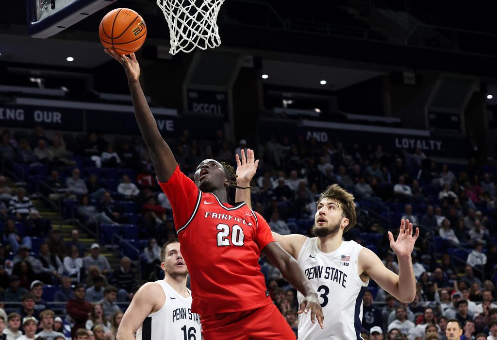Nov 3, 2025; University Park, Pennsylvania, USA; Fairfield Stags forward Brandon Benjamin (20) drives the ball to the basket during the second half against the Penn State Nittany Lions at Bryce Jordan Center. Mandatory Credit: Matthew O'Haren-Imagn Images
