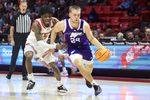 Nov 8, 2025; Salt Lake City, Utah, USA; Weber State Wildcats guard Jace Whiting (24) drives against Utah Utes guard Don McHenry (3) during the first half at Jon M. Huntsman Center. Mandatory Credit: Rob Gray-Imagn Images