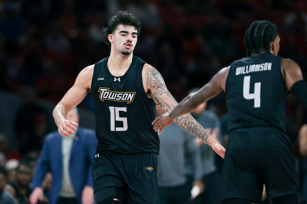 Nov 8, 2025; Houston, Texas, USA; Towson Tigers guard Tyler Tejada (15) reacts after scoring a basket during the second half against the Houston Cougars at Fertitta Center. Mandatory Credit: Troy Taormina-Imagn Images