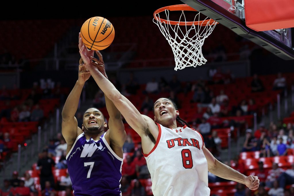 Nov 8, 2025; Salt Lake City, Utah, USA; Weber State Wildcats center Malek Gomma (7) and Utah Utes forward Keanu Dawes (8) battle for a rebound during the second half at Jon M. Huntsman Center. Mandatory Credit: Rob Gray-Imagn Images