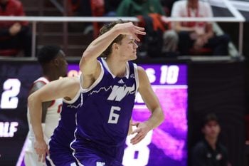 Nov 8, 2025; Salt Lake City, Utah, USA; Weber State Wildcats guard Trevor Hennig (6) reacts to a basket against the Utah Utes during the second half at Jon M. Huntsman Center. Mandatory Credit: Rob Gray-Imagn Images
