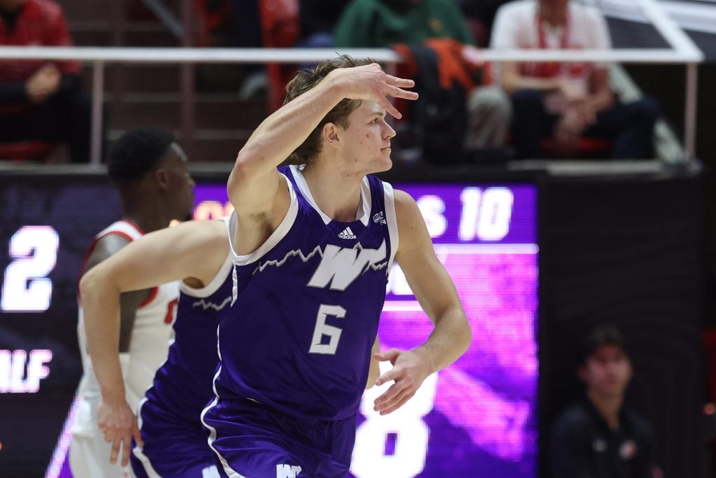 Nov 8, 2025; Salt Lake City, Utah, USA; Weber State Wildcats guard Trevor Hennig (6) reacts to a basket against the Utah Utes during the second half at Jon M. Huntsman Center. Mandatory Credit: Rob Gray-Imagn Images