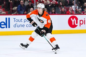 Nov 4, 2025; Montreal, Quebec, CAN; Philadelphia Flyers center Trevor Zegras (46) plays the puck against the Montreal Canadiens during shootout at Bell Centre. Mandatory Credit: David Kirouac-Imagn Images
