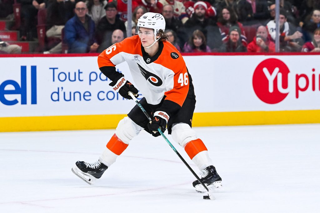 Nov 4, 2025; Montreal, Quebec, CAN; Philadelphia Flyers center Trevor Zegras (46) plays the puck against the Montreal Canadiens during shootout at Bell Centre. Mandatory Credit: David Kirouac-Imagn Images