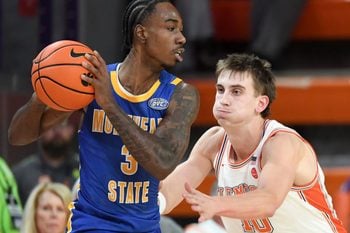 Morehead State Eagles guard George Marshall (3) is defended by Clemson Tigers forward Jake Wahlin (10) Tuesday, Nov. 11, 2025, during the NCAA men’s basketball game at Littlejohn Coliseum in Clemson, South Carolina. Clemson Tigers won 83-56.