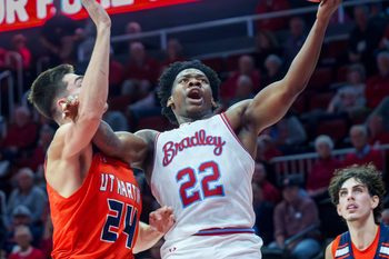 Bradley’s Jaquan Johnson makes a move to the basket on UT-Martin’s Vladimir Khryapa in the second half of their non-conference basketball game Wednesday, Nov. 12, 2025 at Carver Arena in Peoria.