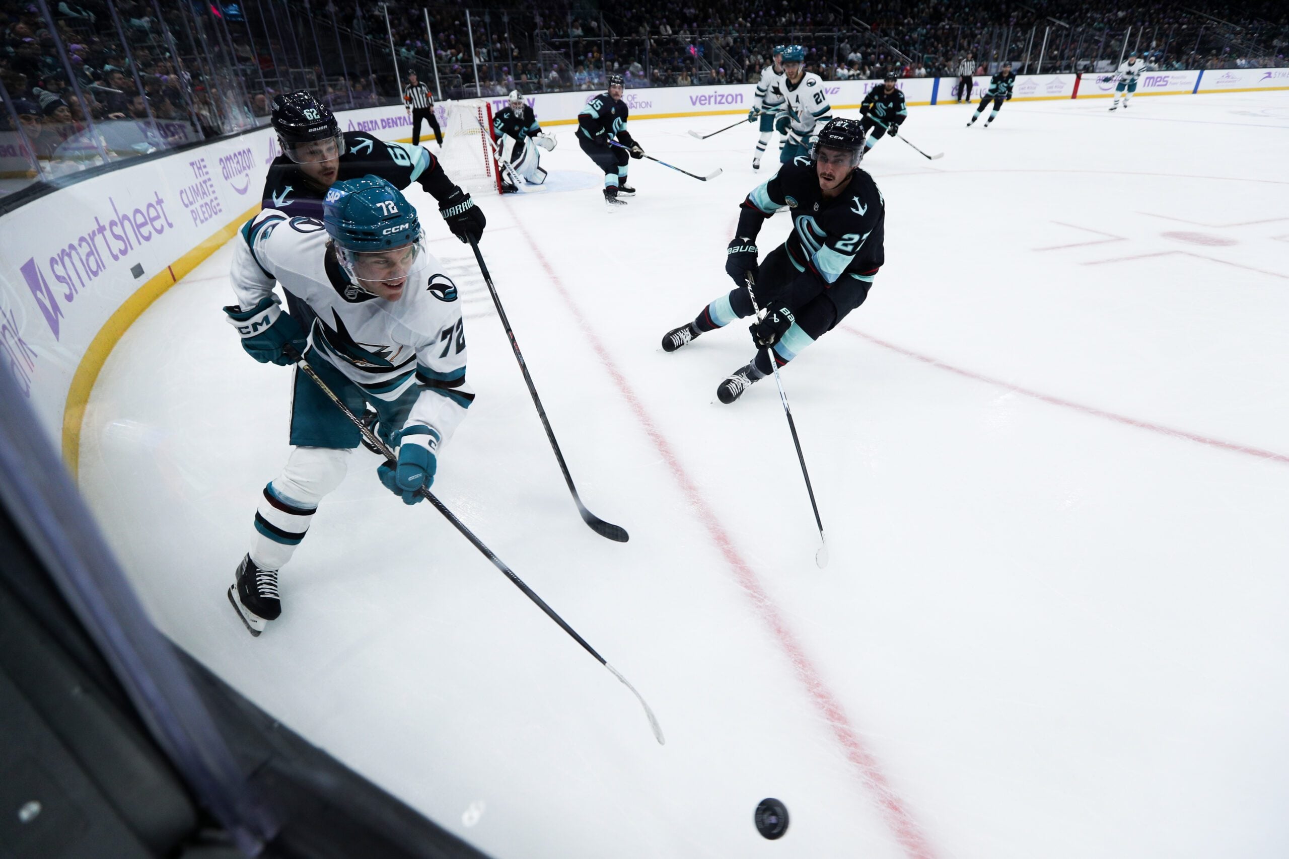 Nov 15, 2025; Seattle, Washington, USA; San Jose Sharks left wing William Eklund (72) drives the puck in the second period against the Seattle Kraken at Climate Pledge Arena. Mandatory Credit: Kevin Ng-Imagn Images