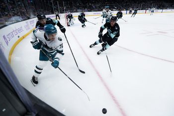 Nov 15, 2025; Seattle, Washington, USA; San Jose Sharks left wing William Eklund (72) drives the puck in the second period against the Seattle Kraken at Climate Pledge Arena. Mandatory Credit: Kevin Ng-Imagn Images